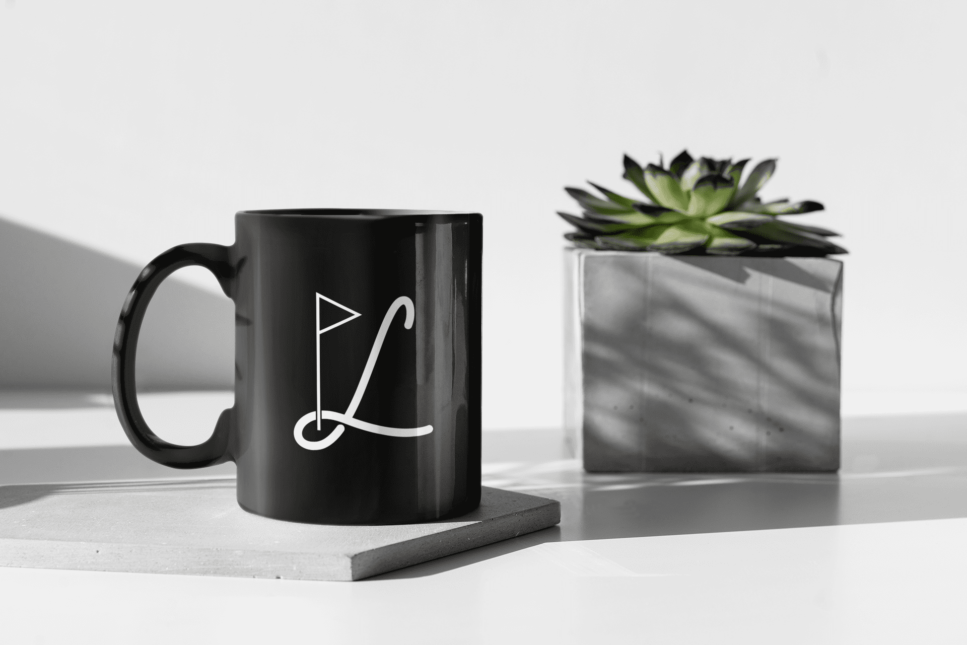 coffee mug mockup featuring a plant pot having a sunbath